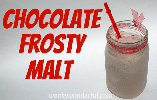 chocolate frosty milkshake in clear glass mug with red straw - photo text: chocolate frosty malt