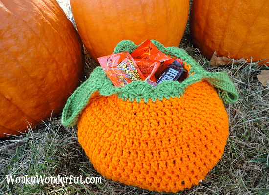crocheted trick or treat bag filled with candy
