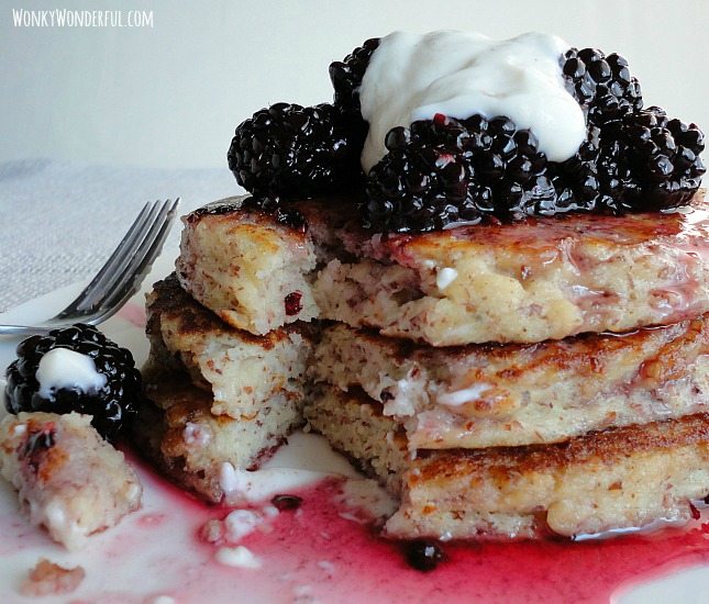 three pancakes that have had a bite cut out