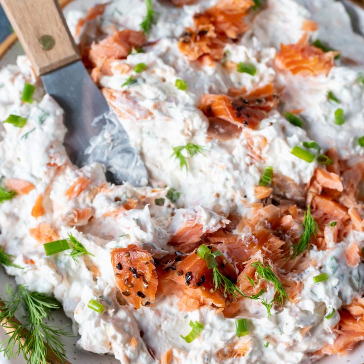 dip topped with smoked salmon and dill