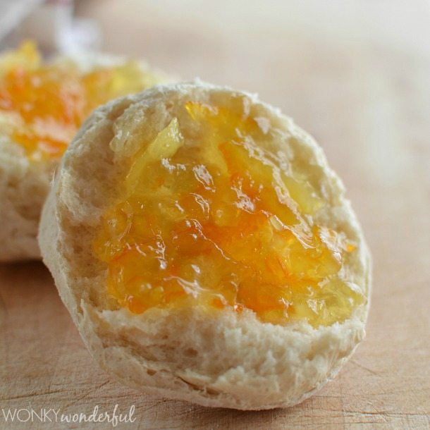 cut biscuit with orange jam