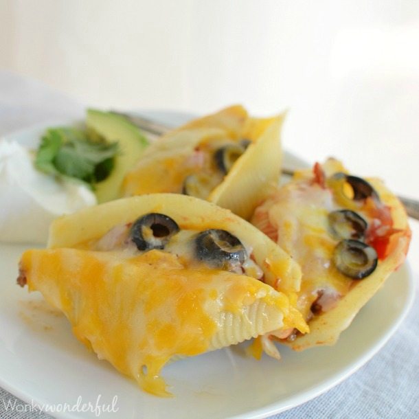 stuffed pasta shells served on white plate