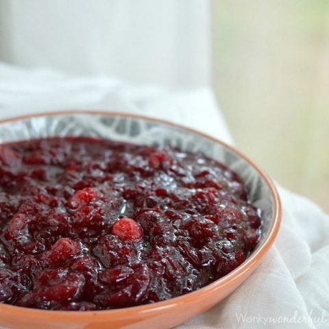 burgundy colored chunky cranberry sauce in bowl