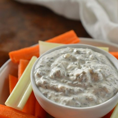 dip and veggies on white plate