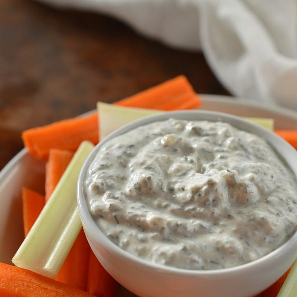 dip and veggies on white plate