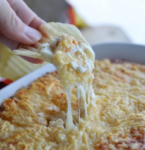 40 Clove Garlic Chicken Dip Recipe - This unforgettable appetizer has an extreme roasted garlic flavor! Use rotisserie chicken and extra cheese in this easy dip recipe!