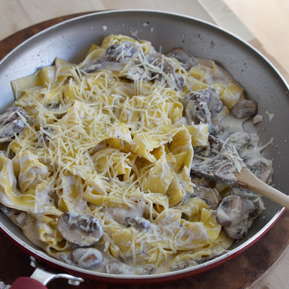 This Mushroom Ricotta Pasta Recipe is an easy and indulgent dinner. Made with mushrooms, ricotta cheese and parmesan. Pure comfort food!