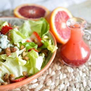 Blood Orange Salad Dressing Recipe - This fresh citrus vinaigrette will brighten up any salad! Serve with tender lettuce, blue cheese, strawberries and nuts for the perfect healthy meal!