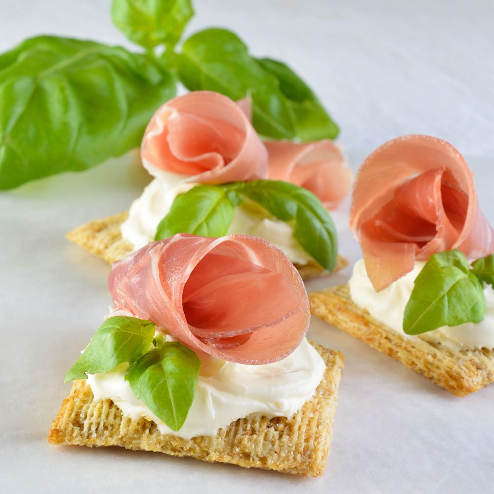 Easy Snack Recipe with Prosciutto, Basil and Mascarpone on Triscuit Crackers - This quick and simple appetizer or snack is impressive and delicious! With just 4 ingredients!