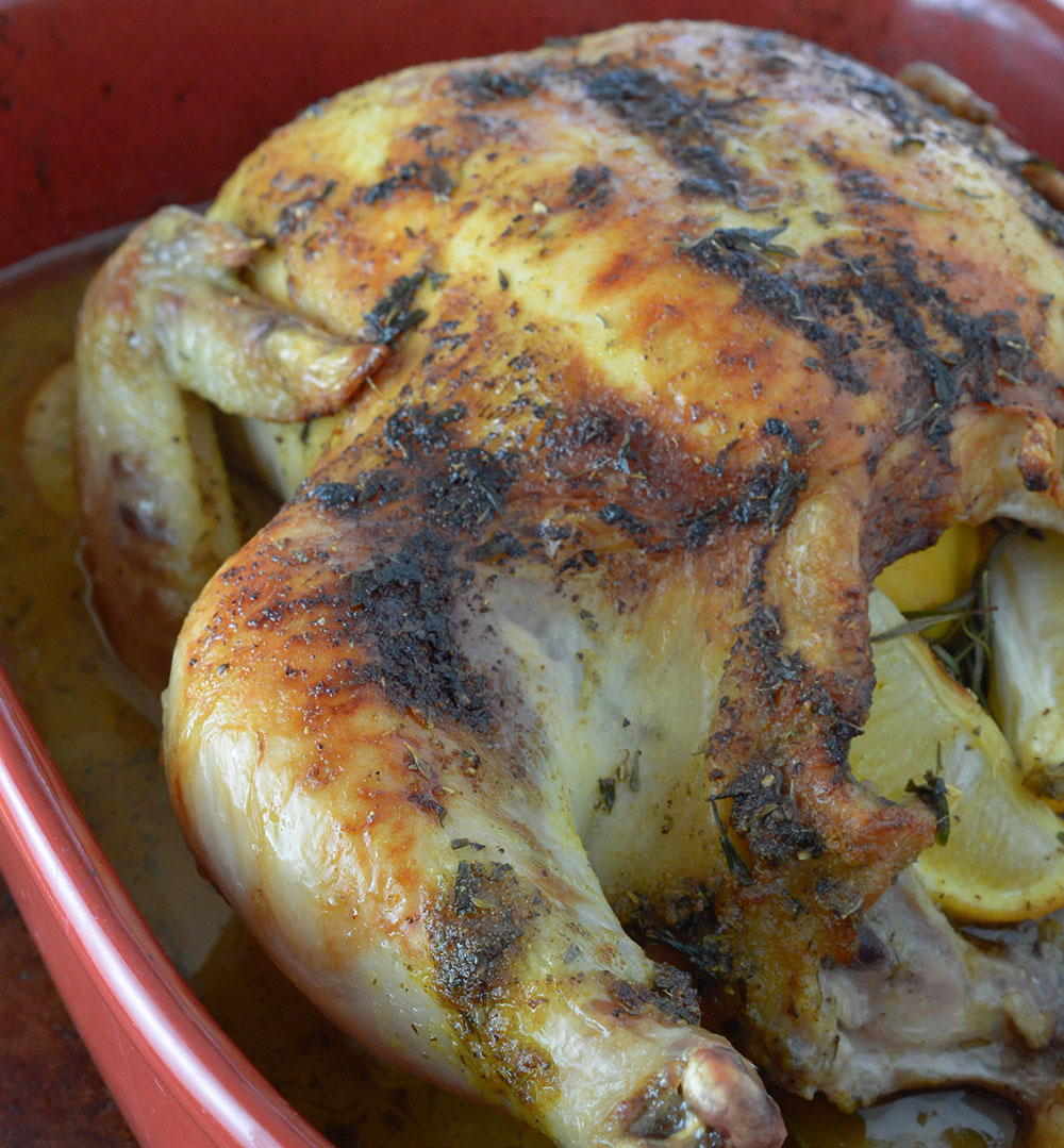 This Oven Roasted Chicken Recipe with Lemon and Rosemary is easy and versatile. Serve as a dinner main course or debone and use in any of your favorite chicken recipes. Makes great leftovers!