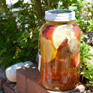 Strawberry Lemonade Sun Tea Recipe - This is the perfect summertime beverage. A naturally fruit flavored tea with no added sugar!
