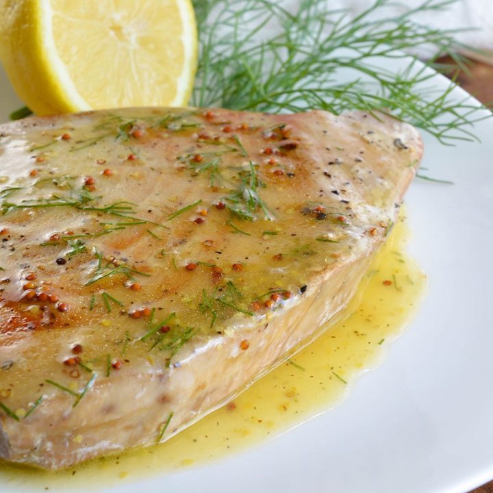 Pan Seared Tuna Steak with Lemon Dill Sauce makes a flavorful and healthy meal. This nutritious lunch or dinner is full of protein and ready in about 10 minutes!