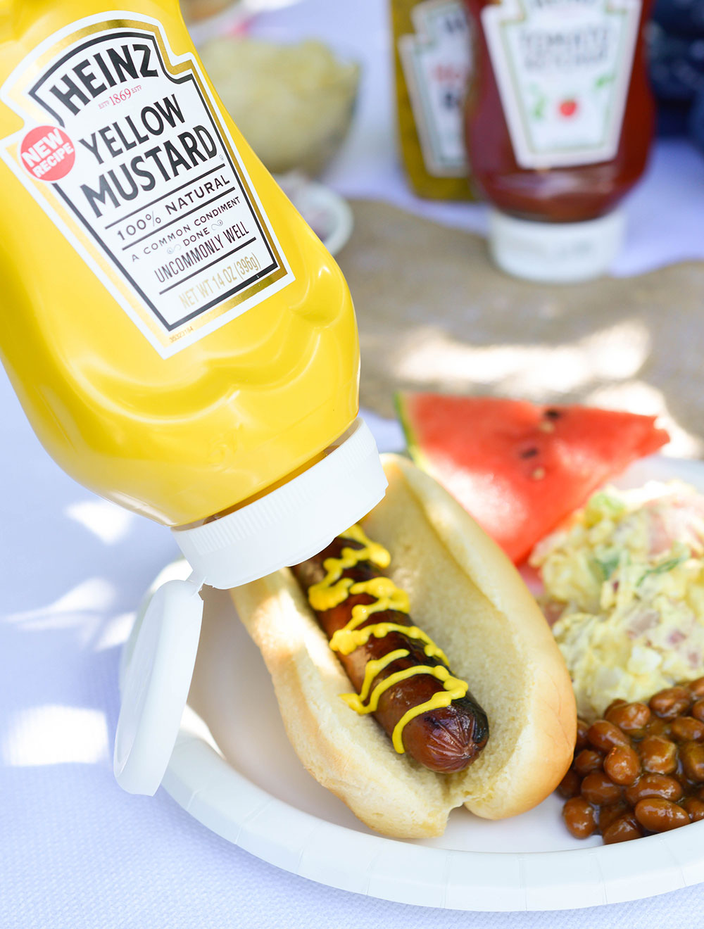 HEINZ Yellow Mustard - The perfect complement to a grilled hot dog!