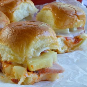 Oven Baked Hawaiian Pizza Sandwiches! Melty Cheese, Canadian Bacon, Pineapple, Bacon Crumbles and Pizza Sauce Baked on Soft Bread Rolls!