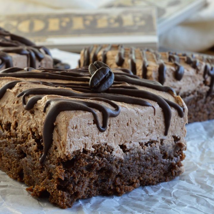 Triple Chocolate Mocha Brownies are the perfect chocolate dessert! Fudgy chocolate brownies spiked with espresso powder then topped with mocha chocolate buttercream frosting and dark chocolate drizzle! Great for anyone that love chocolate and coffee!