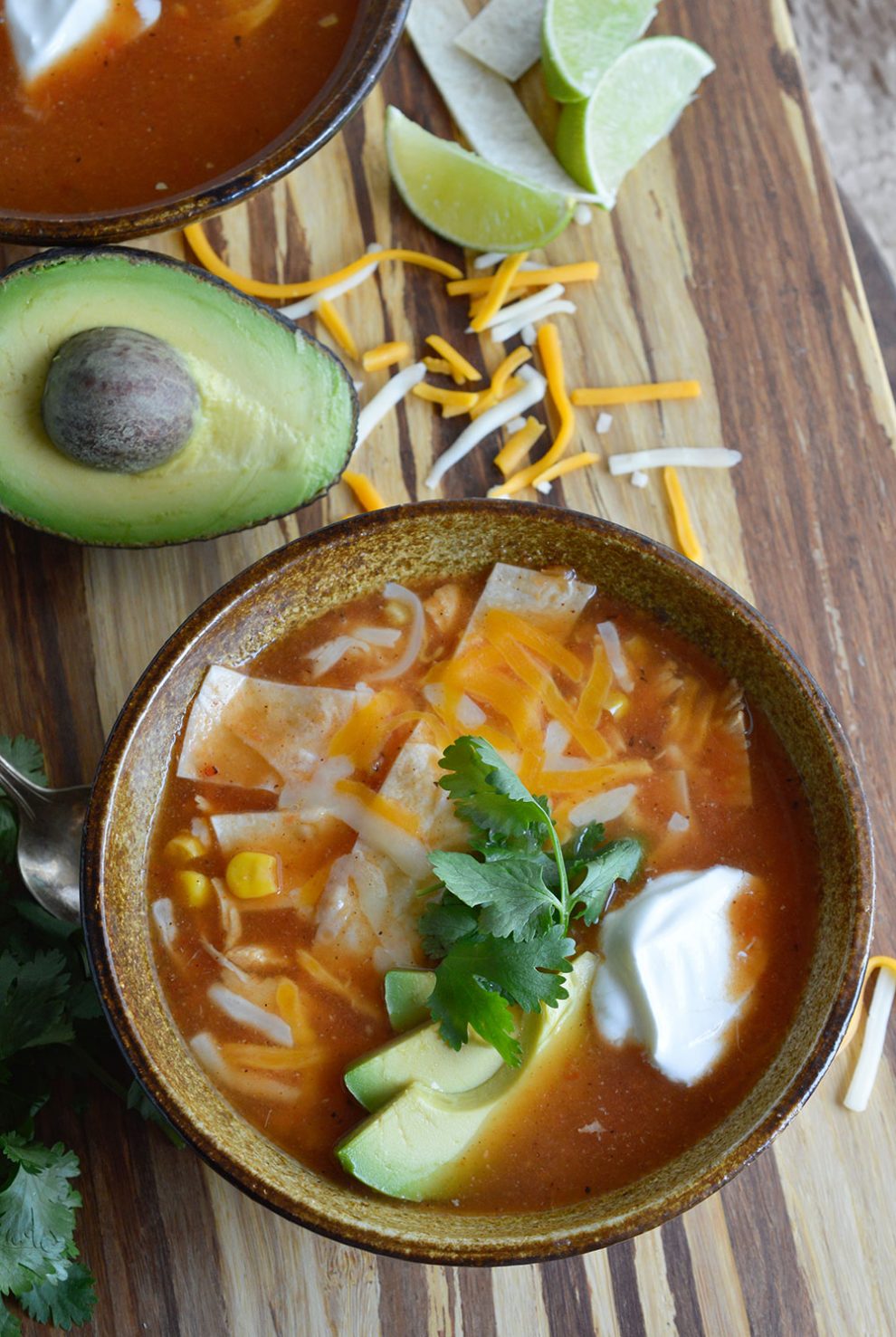 This Chicken Tortilla Soup Recipe is an easy 30 minute meal! This soup is perfect for your weeknight dinner menu!