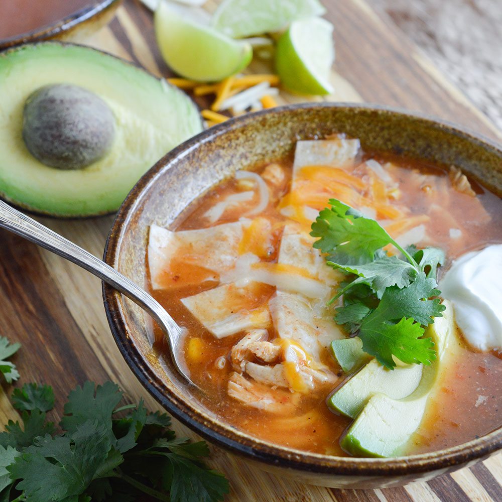 This Chicken Tortilla Soup Recipe is an easy 30 minute meal! This soup is perfect for your weeknight dinner menu!