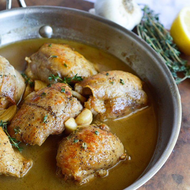 This Lemon Butter Chicken Thigh Recipe is quick, easy and bursting with flavor! Juicy chicken thighs cooked with butter, lemon, thyme and garlic. The perfect one pan weeknight dinner!