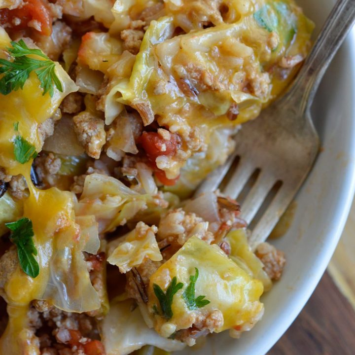 Easy Stuffed Cabbage Casserole is a one pot dinner recipe that is ready in 30 minutes or less! Perfect for a quick weeknight meal.