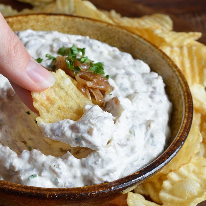 This French Onion Dip Recipe is the perfect party appetizer! Caramelized onions in a cold, creamy dip.