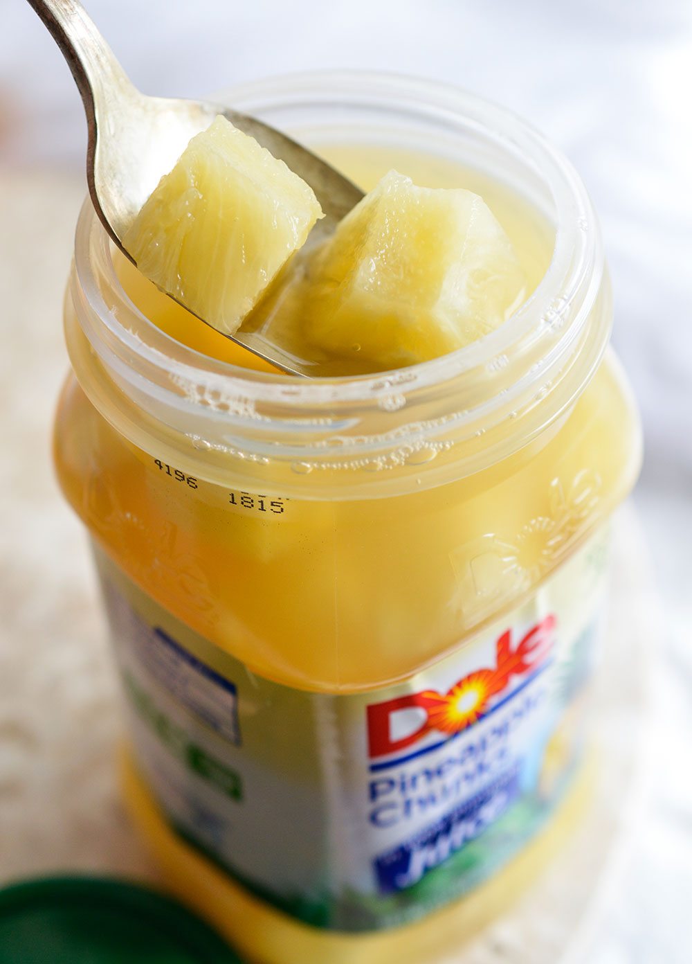 Make a Pineapple Upside Down Yogurt Parfait for a quick and flavorful snack or dessert! This sweet treat is less than 500 calories and comes together in 10 minutes or less!