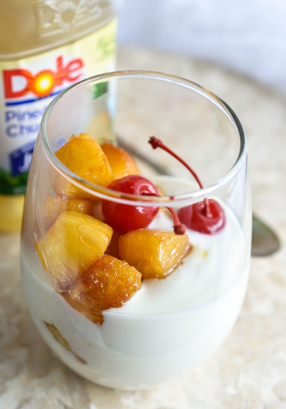 Make a Pineapple Upside Down Yogurt Parfait for a quick and flavorful snack or dessert! This sweet treat is less than 500 calories and comes together in 10 minutes or less!