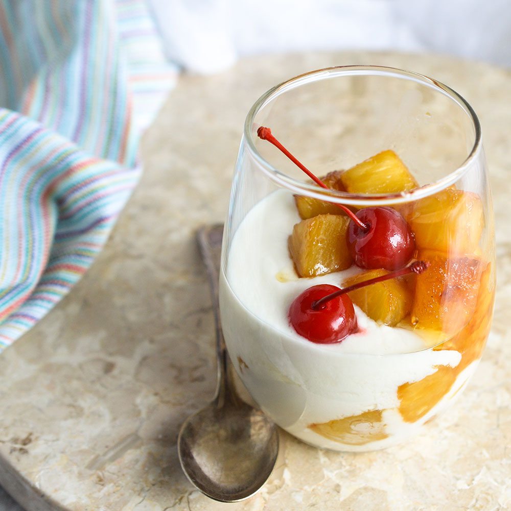 Make a Pineapple Upside Down Yogurt Parfait for a quick and flavorful snack or dessert! This sweet treat is less than 500 calories and comes together in 10 minutes or less!