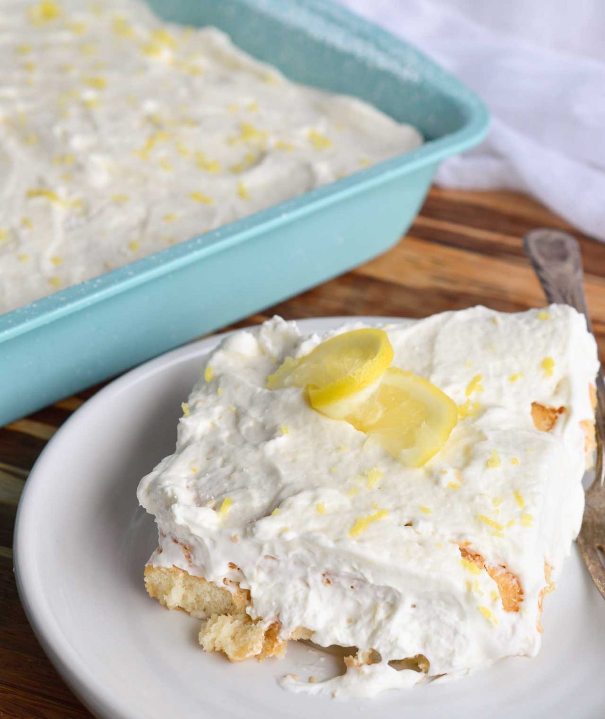 Limoncello Tiramisu is a simple yet sophisticated adult dessert recipe. Think of it as a Boozy Lemon Icebox Cake. Lady finger cookies soaked in limoncello sandwiched between layers of mascarpone whipped cream!