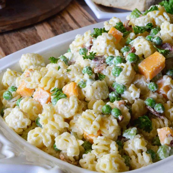 This Easy Pasta Salad Recipe is perfect for picnics, holiday feasts and potlucks! Just in time to make as an Easter side dish. It goes great with a glazed spiral ham!