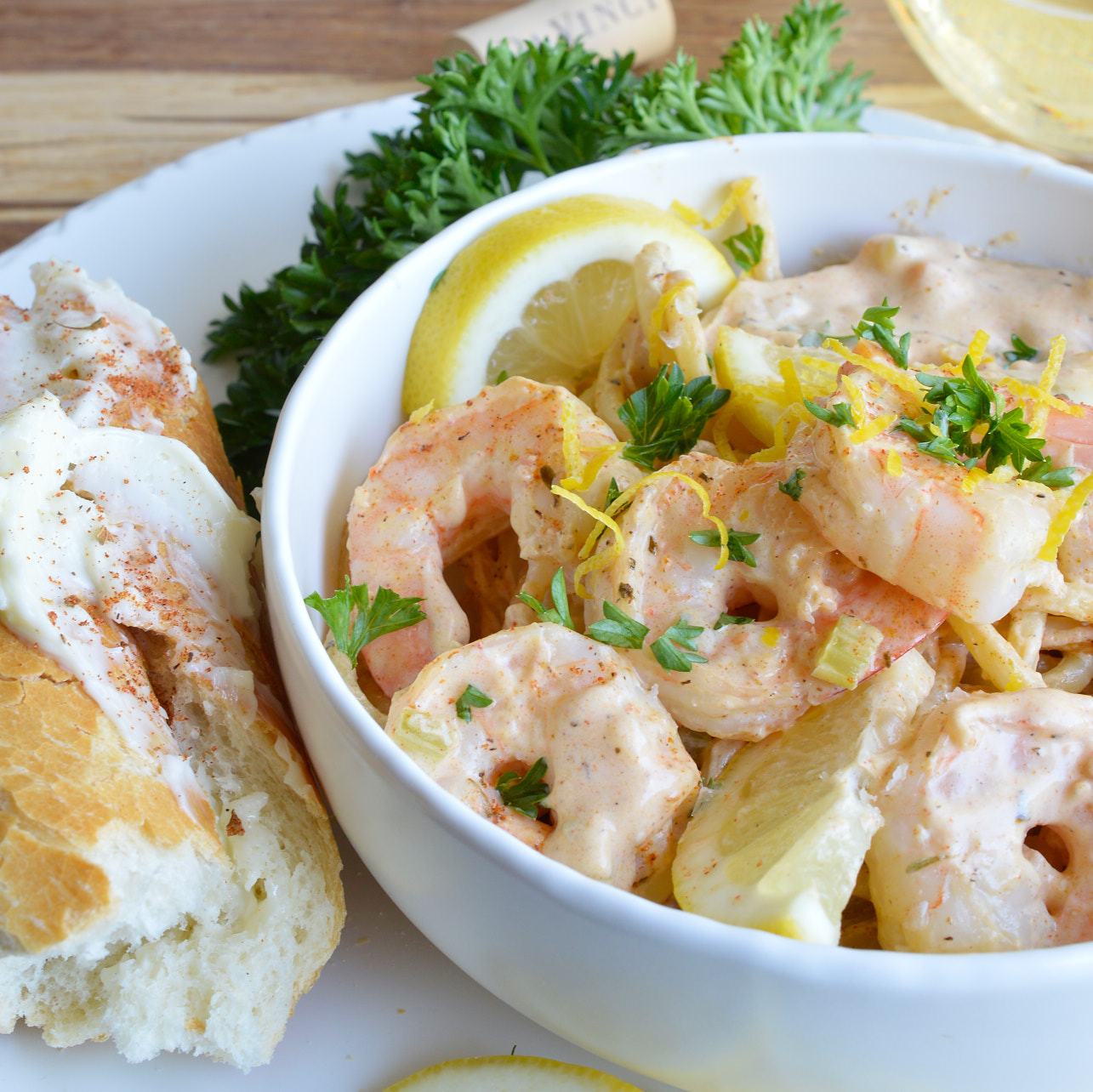 Cajun Shrimp Pasta is a fancy yet simple dinner recipe. Shrimp and pasta slathered in a creamy wine sauce flavored with Cajun spices and lemon zest. Perfect for date night at home!