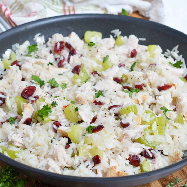 This Turkey Cranberry Rice is great for using up that leftover Thanksgiving turkey. All of the holiday flavors come together in this easy one-pan dinner recipe!