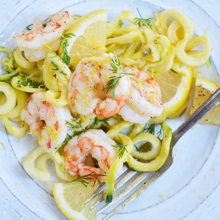 This Lemon Dill Shrimp Zucchini Noodle Recipe is a great way to start the New Year! A great lunch or dinner that is healthy, filling and Whole30 compliant. Shrimp and zoodles tossed with a lemon dill sauce makes a flavorful, nutritious meal!