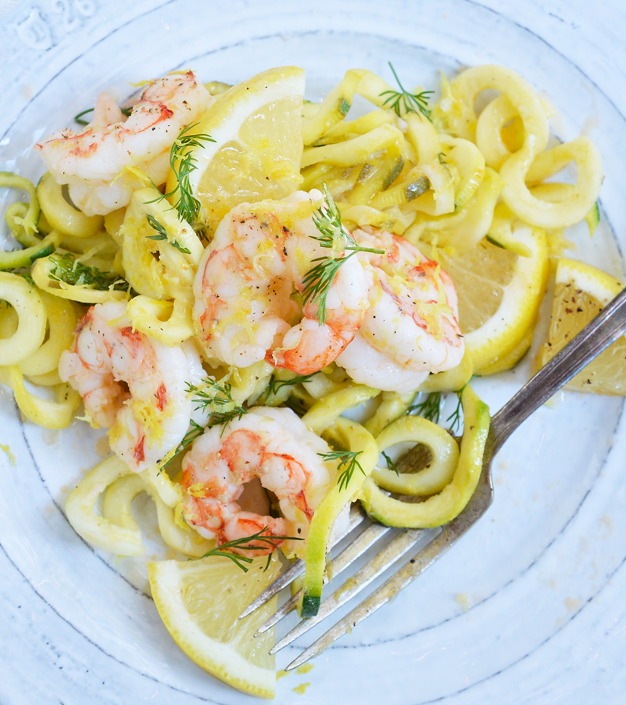 This Lemon Dill Shrimp Zucchini Noodle Recipe is a great way to start the New Year! A great lunch or dinner that is healthy, filling and Whole30 compliant. Shrimp and zoodles tossed with a lemon dill sauce makes a flavorful, nutritious meal!
