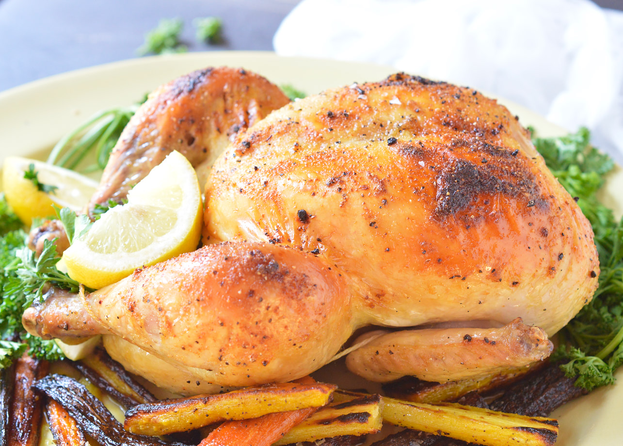 This Zesty Italian Oven Roasted Whole Chicken Recipe requires only 3 ingredients and less than one hour of cook time! Do you want to feed your family nutritious homemade dinners on a more regular basis? Serve your family a juicy, flavorful whole roasted chicken dinner on a busy weeknight. How crazy is that!?!?
