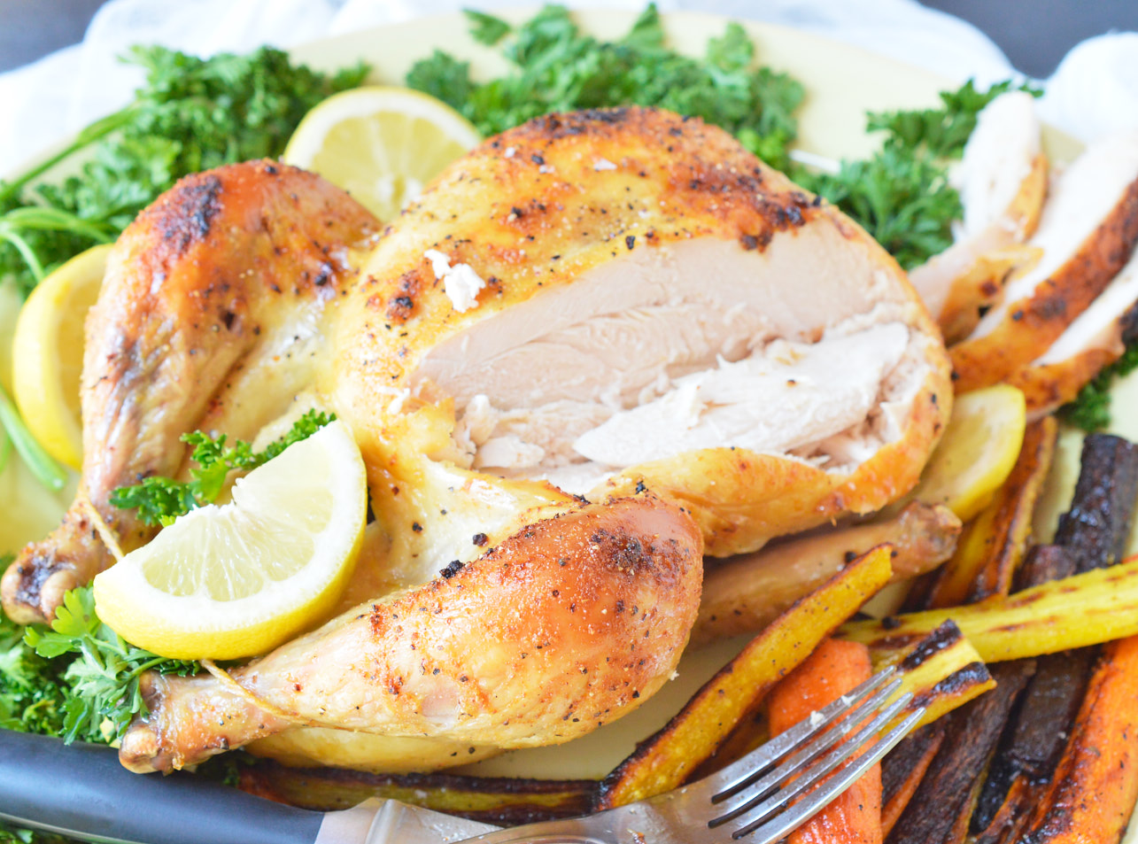 This Zesty Italian Oven Roasted Whole Chicken Recipe requires only 3 ingredients and less than one hour of cook time! Do you want to feed your family nutritious homemade dinners on a more regular basis? Serve your family a juicy, flavorful whole roasted chicken dinner on a busy weeknight. How crazy is that!?!?