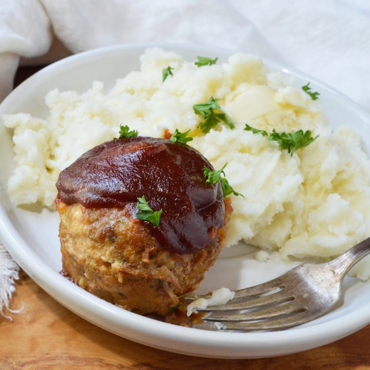 Make your favorite comfort food into individual portions with this Glazed Meatloaf Muffins Recipe! These juicy meatloaves are super flavorful and topped with a sweet, tangy glaze. This easy dinner recipe is sure to be a new family favorite!