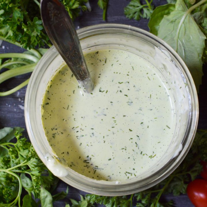 Homemade salad dressings are simple yet so much more flavorful than store bought. This Pesto Ranch Dressing Recipe is no exception. Bright basil pesto flavors blended with buttermilk ranch. This is perfect on salads or served as a pizza dip!