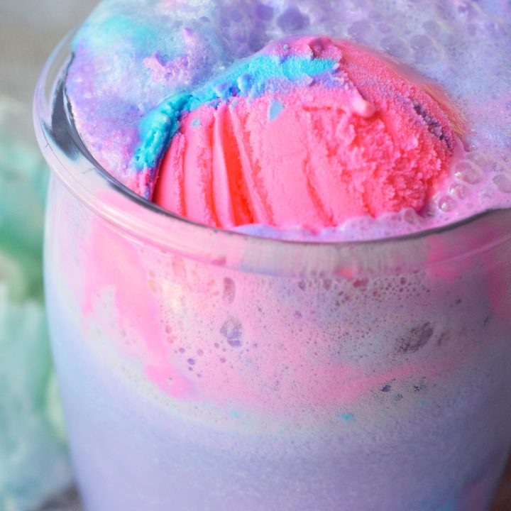 Get the party started with this Cotton Candy Unicorn Party Punch and Unicorn Ice Cream Cake! The punch recipe is made simply with 2 ingredients and the ice cream cake takes just minutes to decorate. The kids will love this fun and colorful drink!
