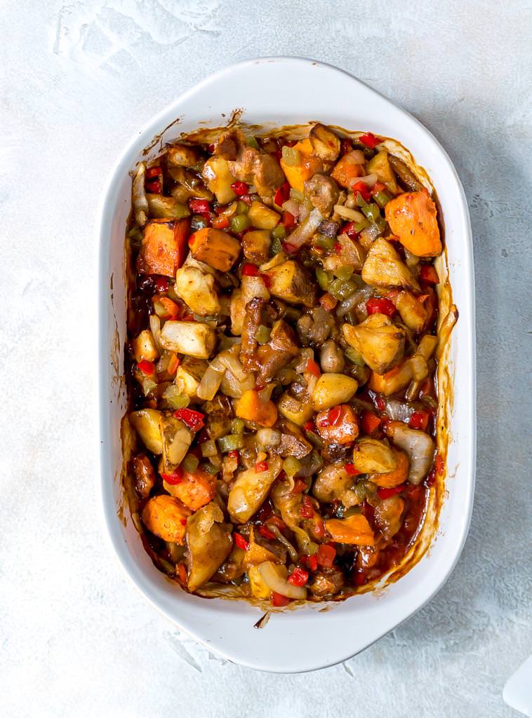 over head photo of white roasting dish filled with an easy weeknight dinner