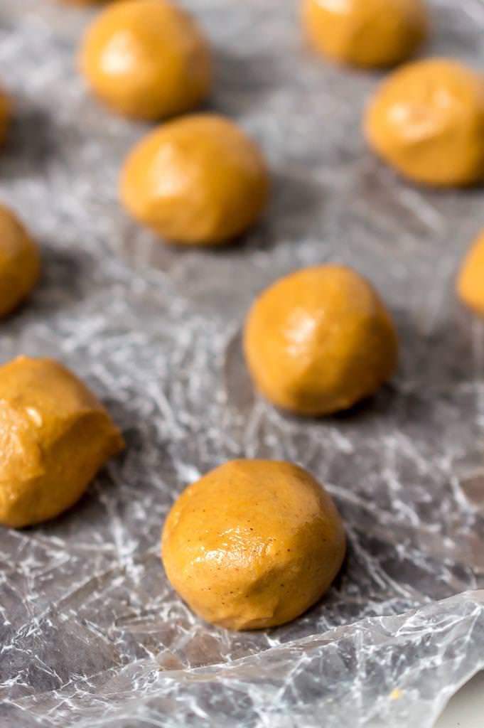 photo of peanut butter protein balls on baking sheet lined with wax paper