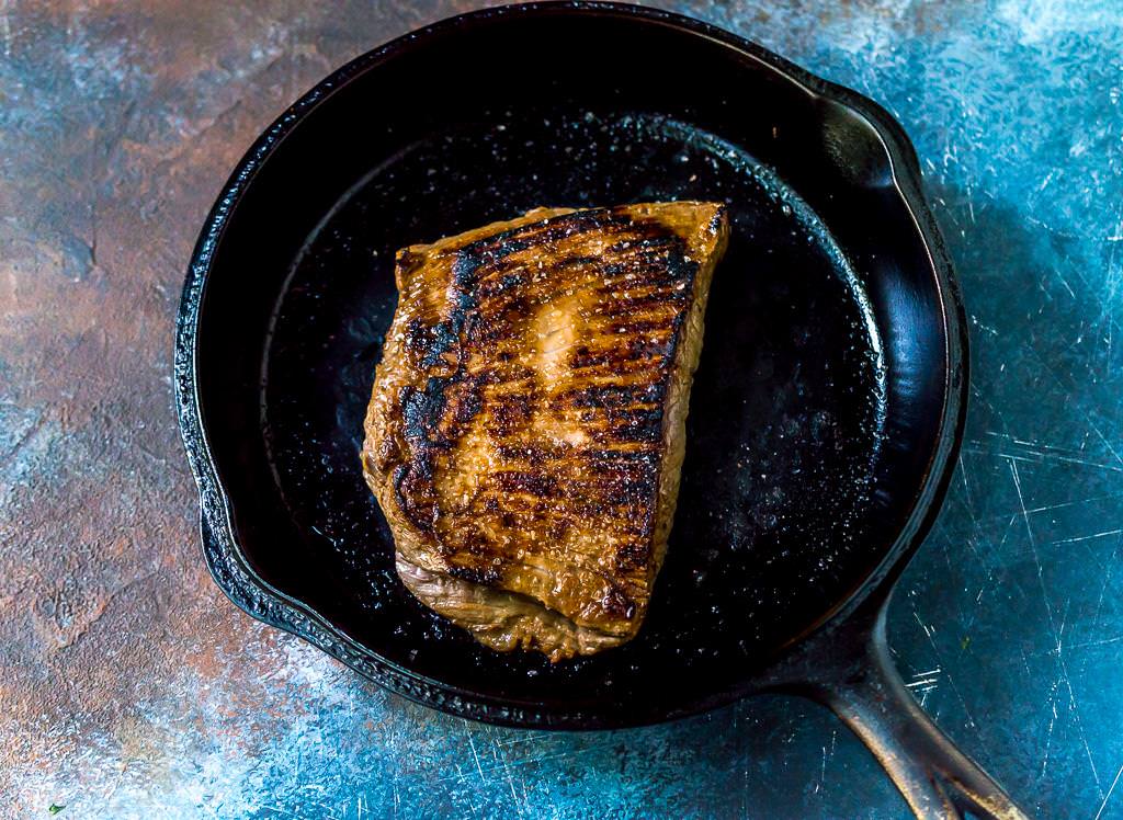 whole flank steak in cast iron pan