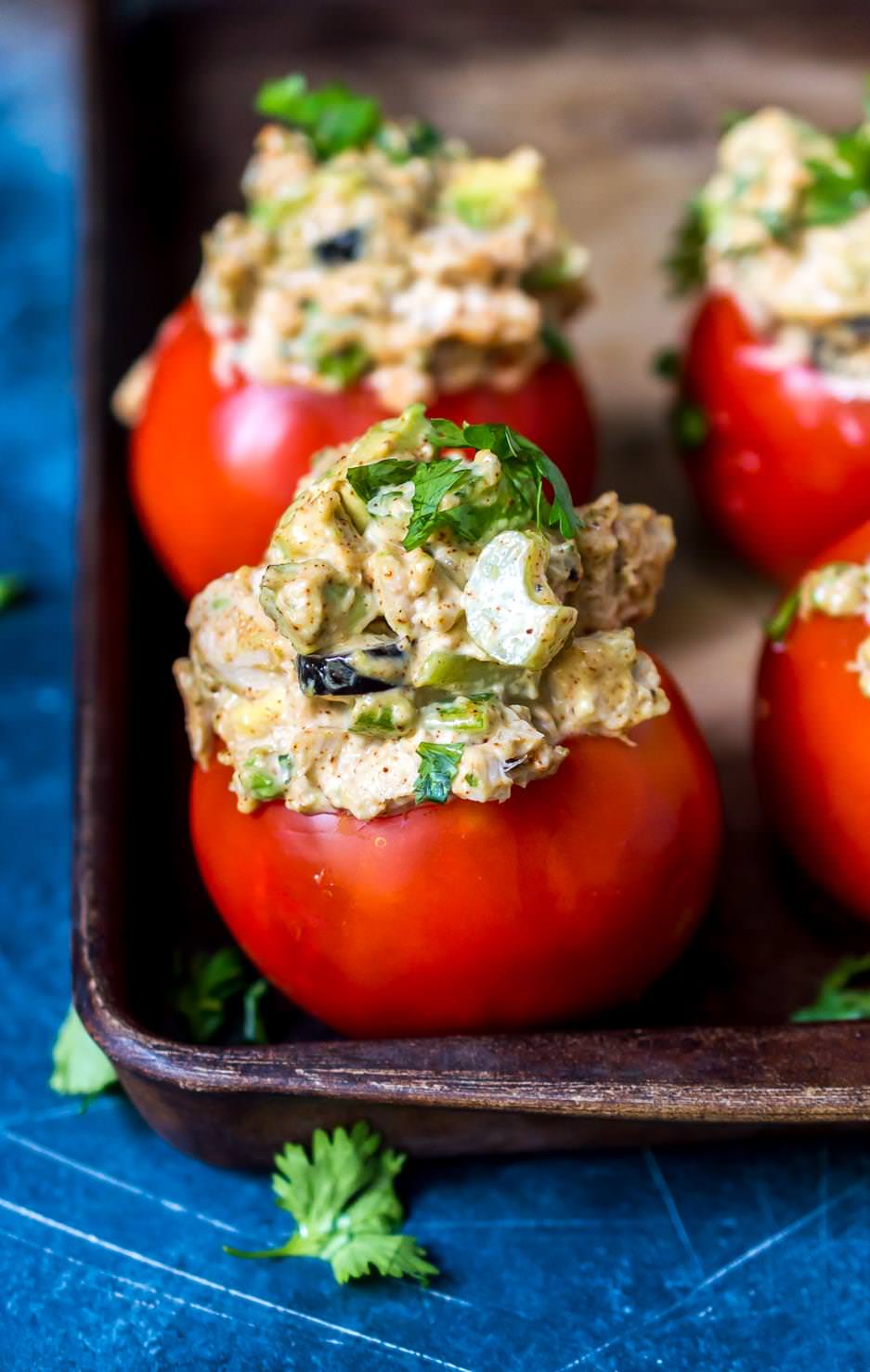 taco tuna stuffed tomatoes topped with fresh cilantro
