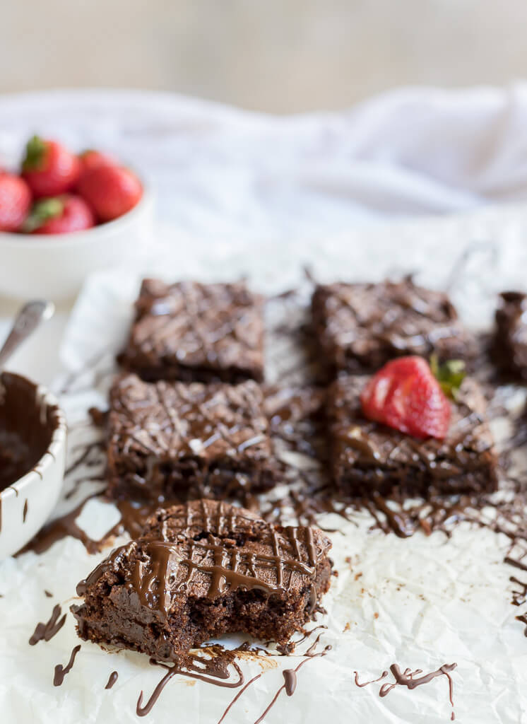 gluten free brownies, one with a bite taken out