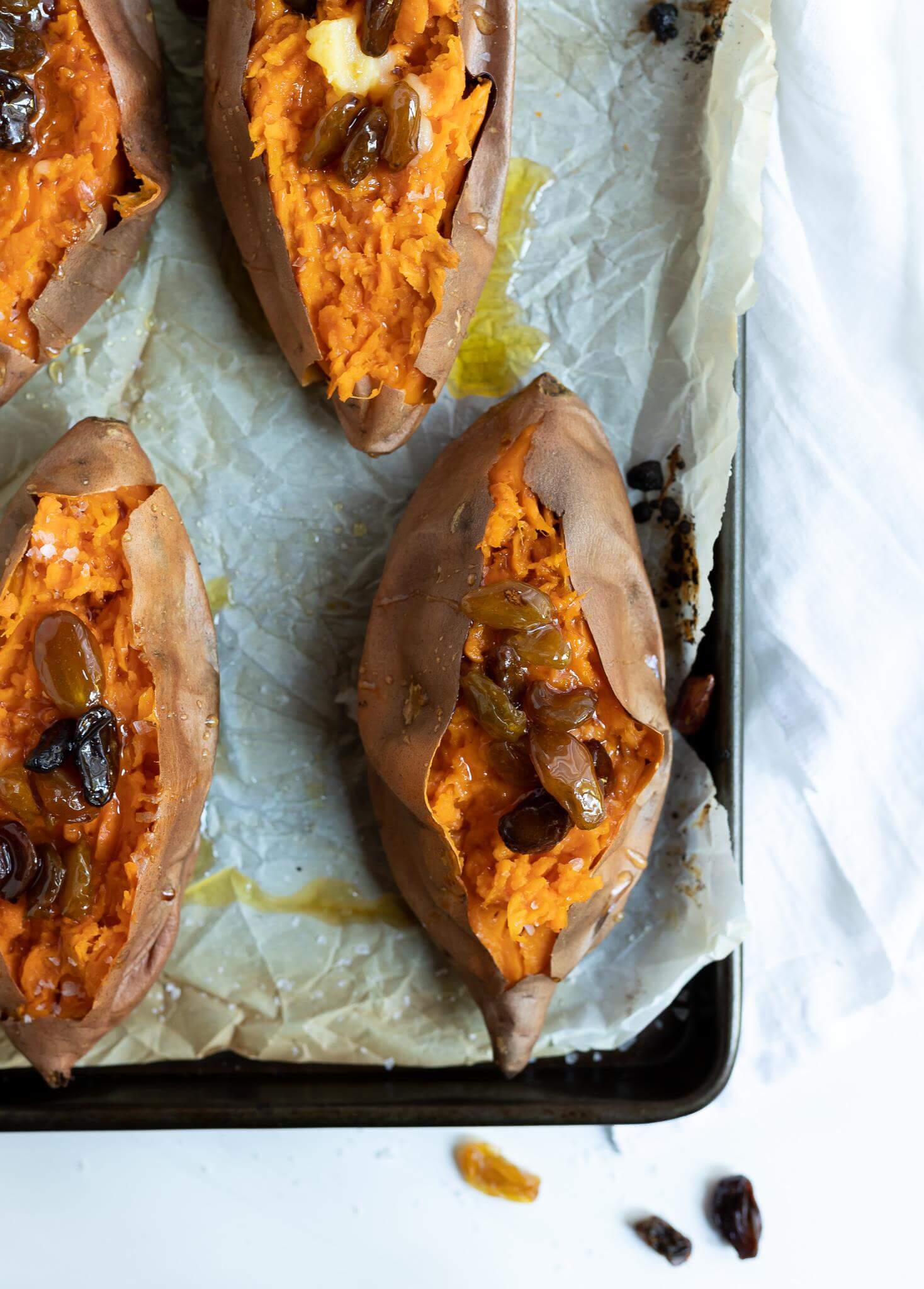 roasted sweet potatoes topped with honey raisins 