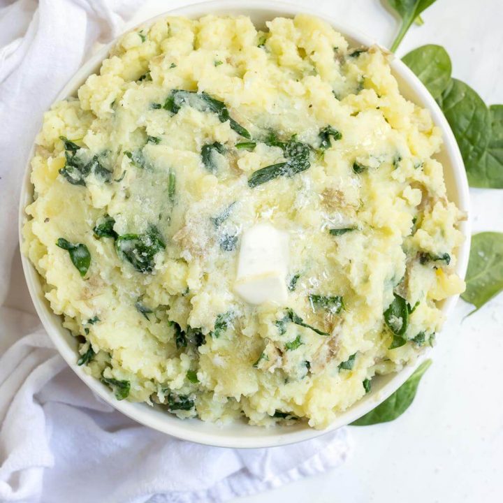 whole 30 mashed potatoes with spinach in white bowl