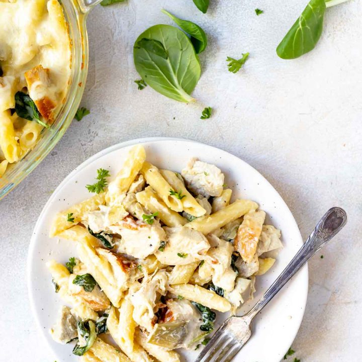 chicken alfredo baked ziti recipe served on white plate with silver fork