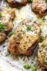 pork chops on baking sheet