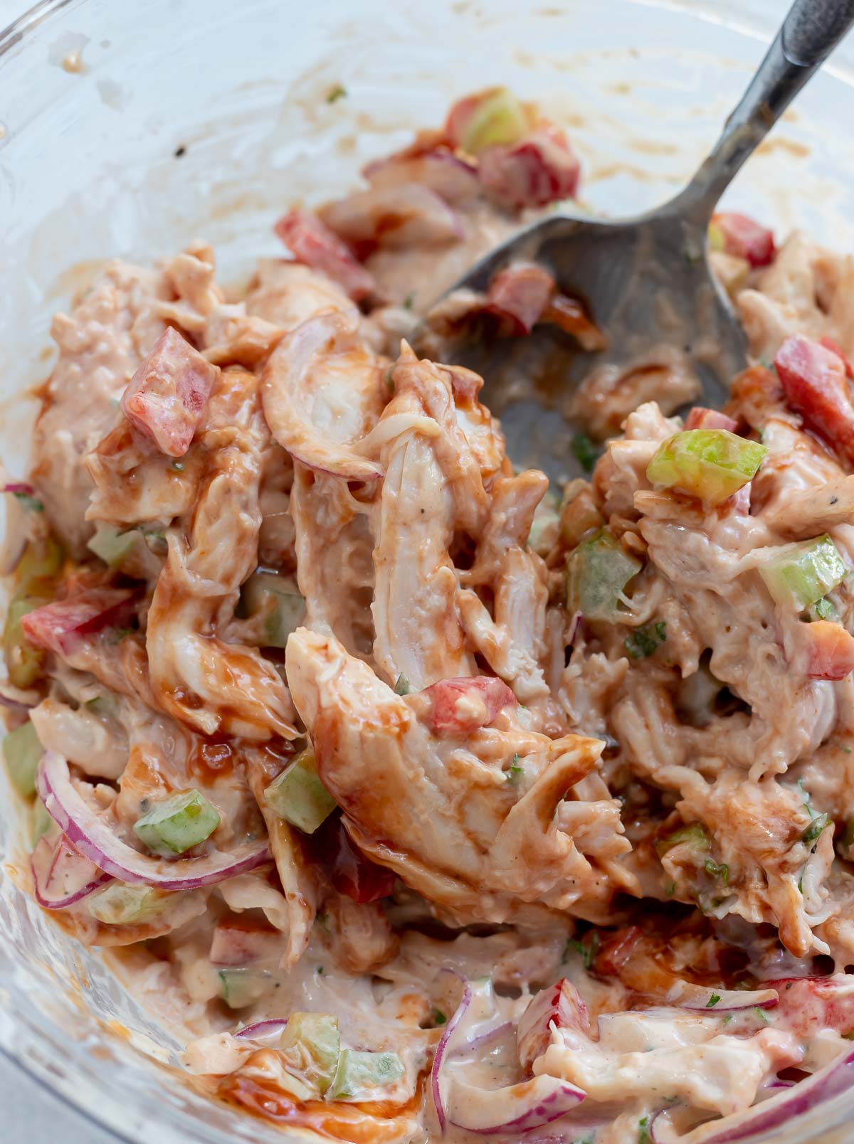 prepared chicken salad in glass bowl