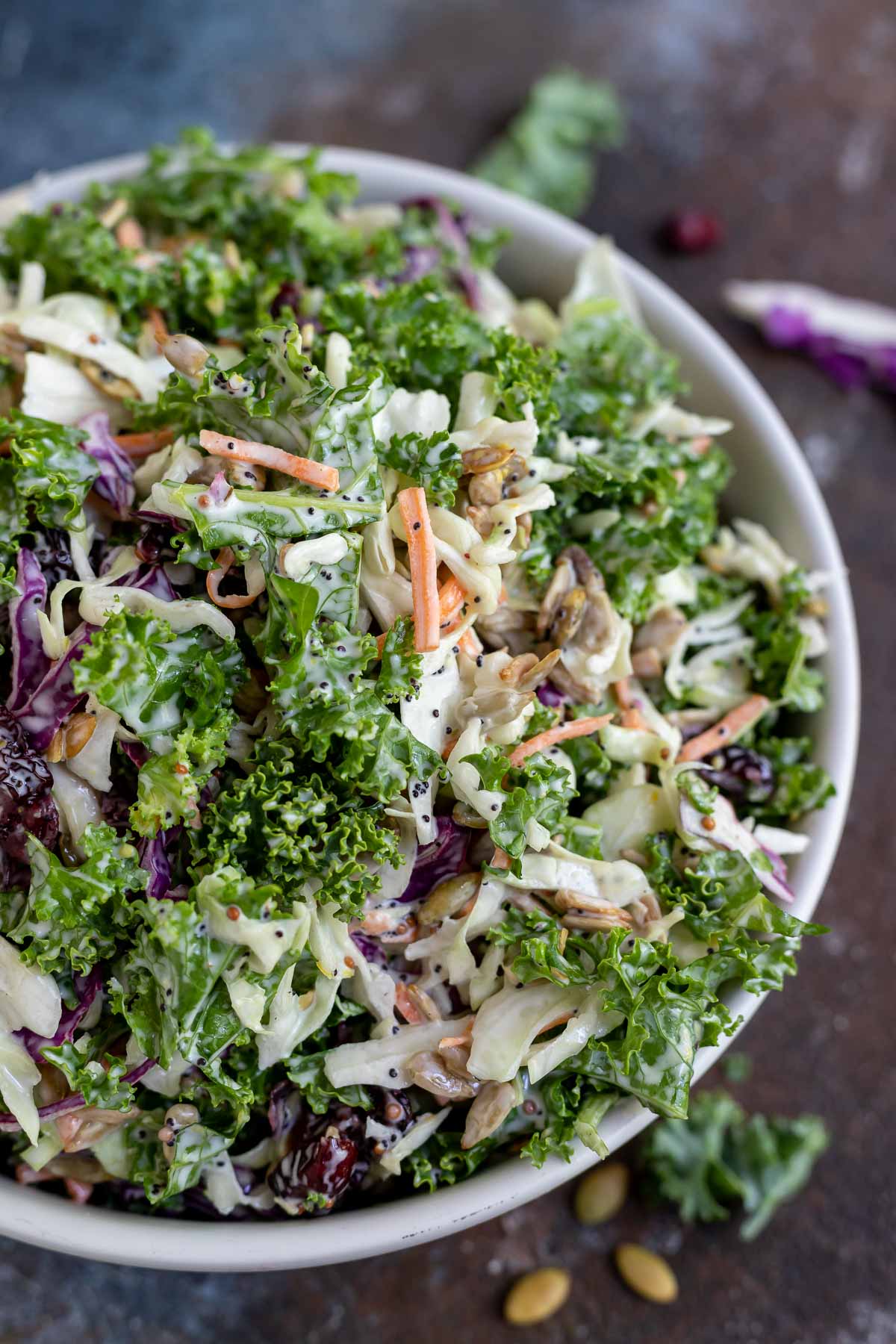 creamy kale salad coleslaw in white bowl