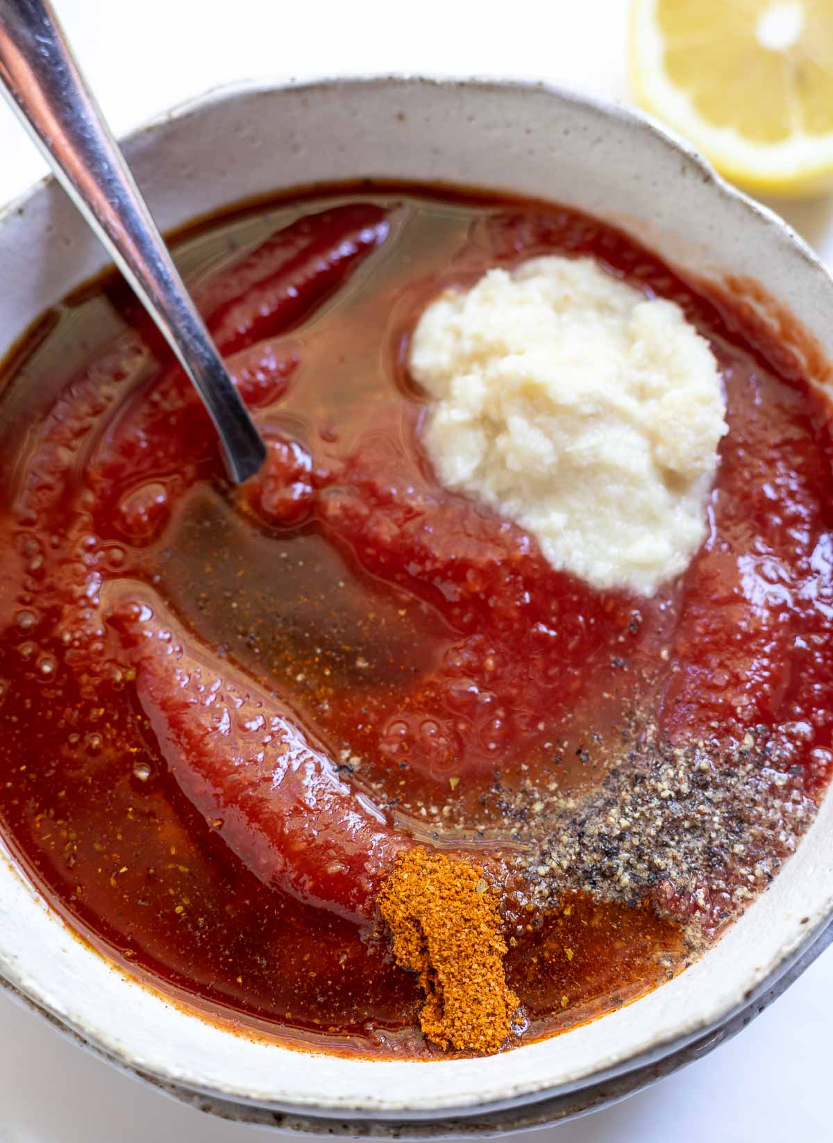 cocktail sauce ingredients in white bowl